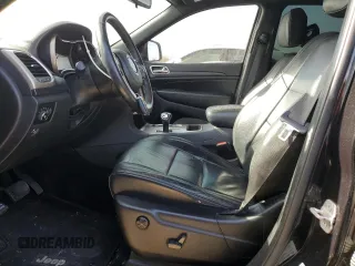 2014 Jeep Grand Cherokee Laredo with VIN 1C4RJEAGXEC217249, listed as a Copart auction lot 48585195 with 131,635 mi miles and Salvage Title. Bid and sale history available at DreamBid. Image 7.