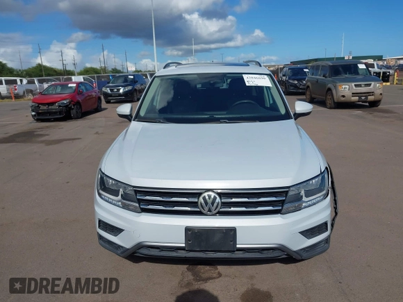 2018 Volkswagen Tiguan SEL z VIN 3VV3B7AX7JM126402, wystawiony jako IAAI lot #42046690 z przebiegiem 54 790 mil mil oraz . Historia ofert i sprzedaży dostępna na DreamBid. Obrazek 12.