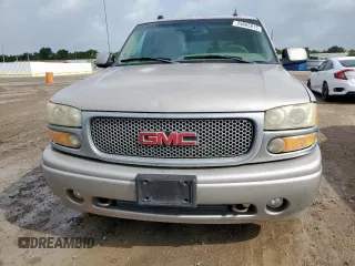 2004 GMC Yukon Denali z VIN 1GKEK63U84J298285, wystawiony jako Copart lot #59865815 z przebiegiem 168 414 mil mil oraz Czysty tytuł • Clean title. Historia ofert i sprzedaży dostępna na DreamBid. Obrazek 5.