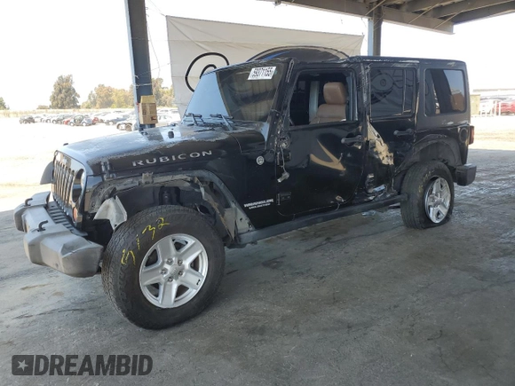 2011 Jeep Wrangler Unlimited Rubicon with VIN 1J4HA6H1XBL589103, listed as a Copart auction lot 59371155 with 156,320 mi miles and Salvage title. Bid and sale history available at DreamBid. Image 1.