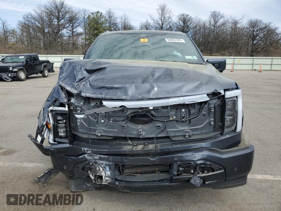 2022 Ford F-150 Lightning Pro z VIN 1FT6W1EV7NWG10601, wystawiony jako Copart lot #55057445 z przebiegiem Nie podano mil oraz Szkoda całkowita • Salvage title. Historia ofert i sprzedaży dostępna na DreamBid. Obrazek 5.