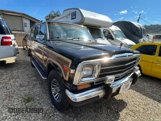 1987 Jeep Grand Wagoneer с VIN 1JCNJ15U7HT153505, выставлен на аукционе Copart как лот 46373925 с пробегом 57 931 миль миль и Чистый • Clean title. История ставок и продаж доступна на DreamBid. Изображение 1.