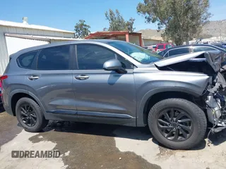 2019 Hyundai Santa Fe SE with VIN 5NMS23AD7KH009688, listed as a IAAI auction lot 41991686 with 77,942 mi miles and . Bid and sale history available at DreamBid. Image 14.