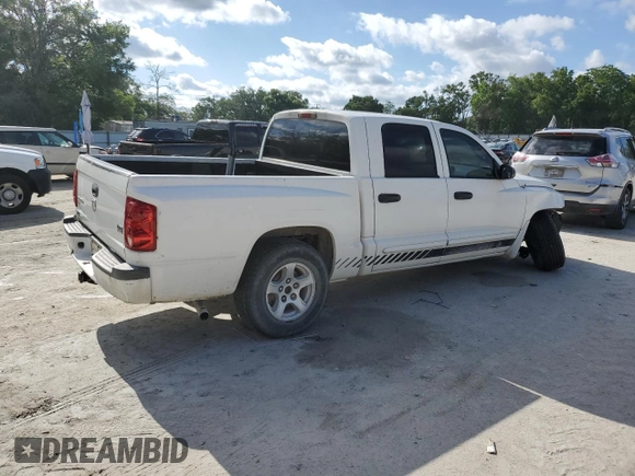 2006 Dodge Dakota SLT with VIN 1D7HE48N46S605282, listed as a Copart auction lot 52635085 with 275,039 mi miles and Salvage Title. Bid and sale history available at DreamBid. Image 3.