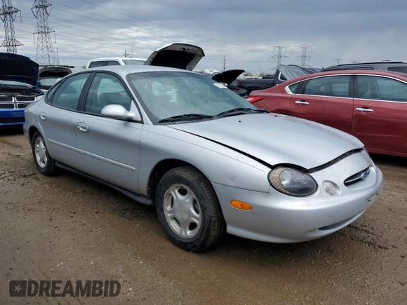 1999 Ford Taurus SE with VIN 1FAFP53U2XA134648, listed as a Copart auction lot 54305325 with 56,794 mi miles and Clean title. Bid and sale history available at DreamBid. Image 4.