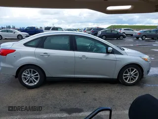 2016 Ford Focus SE with VIN 1FADP3F25GL384296, listed as a IAAI auction lot 41765750 with 158,695 mi miles. Bid and sale history available at carsss.com. Image 13.