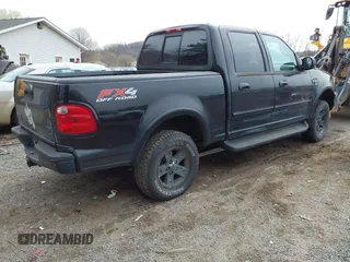 2002 Ford F-150 XLT with VIN 1FTRW08L12KB91777, listed as a IAAI auction lot 42007013 with 192,758 mi miles. Bid and sale history available at carsss.com. Image 4.