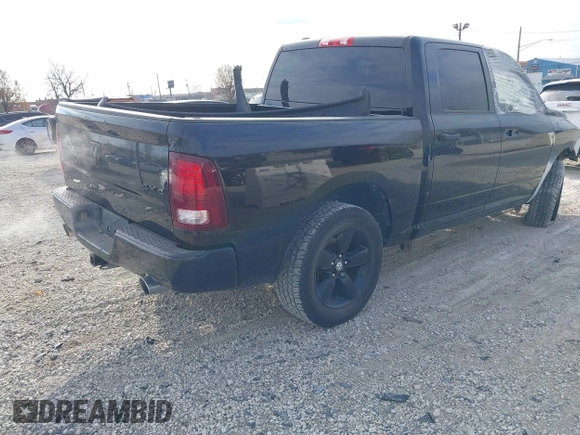 2014 Ram 1500 Express with VIN 1C6RR7KT1ES158623, listed as a IAAI auction lot 41023418 with 187,581 mi miles. Bid and sale history available at carsss.com. Image 4.