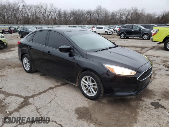 2018 Ford Focus SE with VIN 1FADP3FE9JL244270, listed as a Copart auction lot 44072385 with 111,749 mi miles and Salvage Title. Bid and sale history available at DreamBid. Image 4.