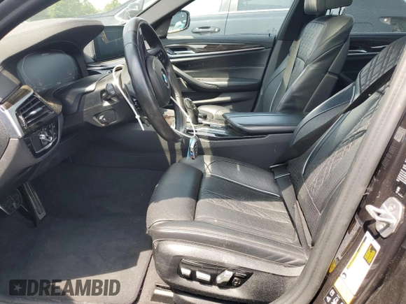 2020 BMW 5 Series M550i xDrive with VIN WBAJS7C06LCD12779, listed as a Copart auction lot 61136215 with 81,286 mi miles and Salvage title. Bid and sale history available at DreamBid. Image 7.
