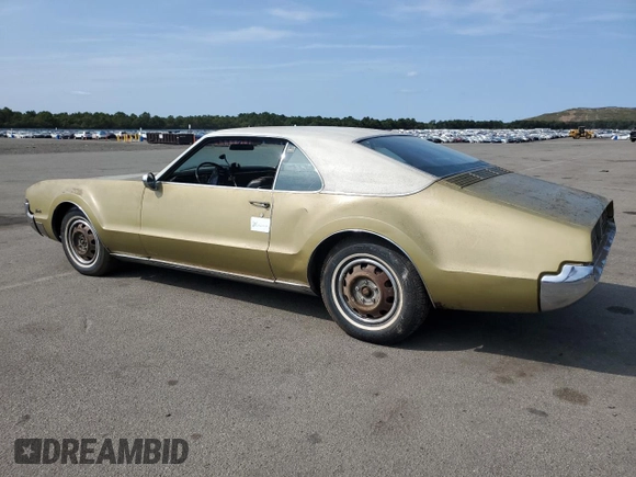 1967 Oldsmobile Toronado with VIN 396877M621130, listed as a Copart auction lot 71016094 with 17,887 mi miles and Salvage Title. Bid and sale history available at DreamBid. Image 2.