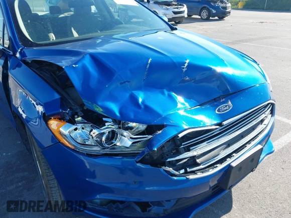 2017 Ford Fusion SE z VIN 3FA6P0H73HR260806, wystawiony jako IAAI lot #42311343 z przebiegiem 143 094 mil mil oraz . Historia ofert i sprzedaży dostępna na DreamBid. Obrazek 6.