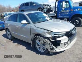 2018 Audi Q3 Premium Plus with VIN WA1JCCFS8JR000583, listed as a IAAI auction lot 41720748 with 115,797 mi miles. Bid and sale history available at carsss.com. Image 1.
