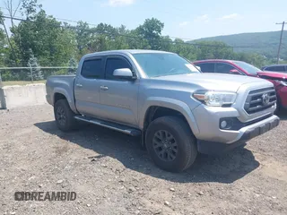 2020 Toyota Tacoma SR5 z VIN 3TMAZ5CN6LM118781, wystawiony jako IAAI lot #42846413 z przebiegiem 48 579 mil mil oraz . Historia ofert i sprzedaży dostępna na DreamBid. Obrazek 1.