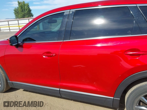 2016 Mazda CX-9 Touring z VIN JM3TCACY9G0122174, wystawiony jako IAAI lot #42613740 z przebiegiem 148 646 mil mil oraz . Historia ofert i sprzedaży dostępna na DreamBid. Obrazek 14.