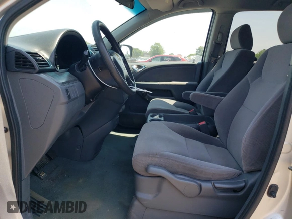 2007 Honda Odyssey LX with VIN 5FNRL38287B054504, listed as a Copart auction lot 59141665 with 128,617 mi miles and Salvage title. Bid and sale history available at DreamBid. Image 7.
