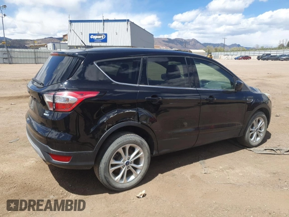 2017 Ford Escape SE with VIN 1FMCU9GD9HUD11375, listed as a Copart auction lot 54952235 with 154,345 mi miles and Clean Title. Bid and sale history available at DreamBid. Image 3.
