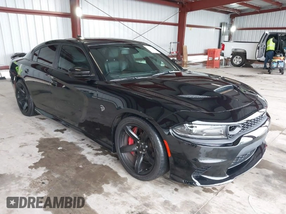 2019 Dodge Charger SRT Hellcat with VIN 2C3CDXL97KH552439, listed as a IAAI auction lot 41813879 with 58,921 mi miles and . Bid and sale history available at DreamBid. Image 1.