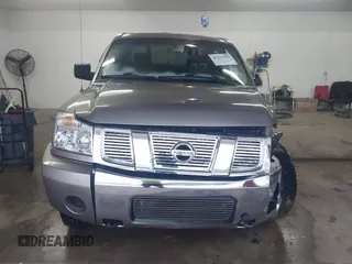 2006 Nissan Titan LE z VIN 1N6BA07B26N572273, wystawiony jako IAAI lot #41252390 z przebiegiem 88 457 mil mil oraz . Historia ofert i sprzedaży dostępna na DreamBid. Obrazek 13.