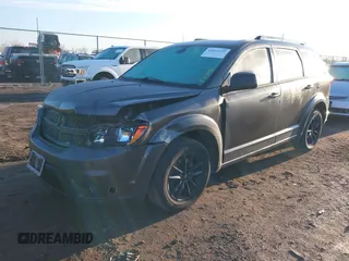 2019 Dodge Journey SE with VIN 3C4PDCBB2KT873970, listed as a IAAI auction lot 41864725 with 91,240 mi miles and . Bid and sale history available at DreamBid. Image 17.