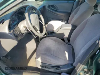 1999 Ford Taurus SE with VIN 1FAFP53U2XG184723, listed as a Copart auction lot 60787115 with 128,277 mi miles and Salvage title. Bid and sale history available at DreamBid. Image 7.