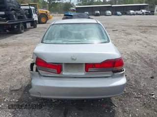 2002 Honda Accord EX z VIN 1HGCG56642A161161, wystawiony jako IAAI lot #41966381 z przebiegiem 258 103 mil mil oraz . Historia ofert i sprzedaży dostępna na DreamBid. Obrazek 16.
