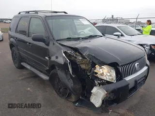 2005 Mercury Mariner Luxury z VIN 4M2CU57115DJ33938, wystawiony jako IAAI lot #42162155 z przebiegiem 174 834 mil mil oraz . Historia ofert i sprzedaży dostępna na DreamBid. Obrazek 1.