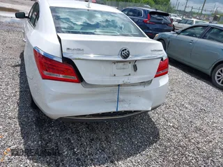 2014 Buick LaCrosse with VIN 1G4GA5GR0EF211194, listed as a IAAI auction lot 42251943 with 146,518 mi miles and . Bid and sale history available at DreamBid. Image 6.