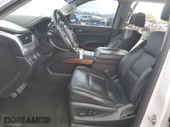 2018 Chevrolet Tahoe Premier with VIN 1GNSKCKC6JR195246, listed as a Copart auction lot 54887165 with 135,973 mi miles and Salvage title. Bid and sale history available at DreamBid. Image 7.
