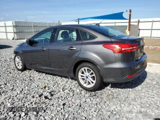 2018 Ford Focus SE with VIN 1FADP3F2XJL254344, listed as a Copart auction lot 54663115 with 84,850 mi miles and Salvage title. Bid and sale history available at DreamBid. Image 2.