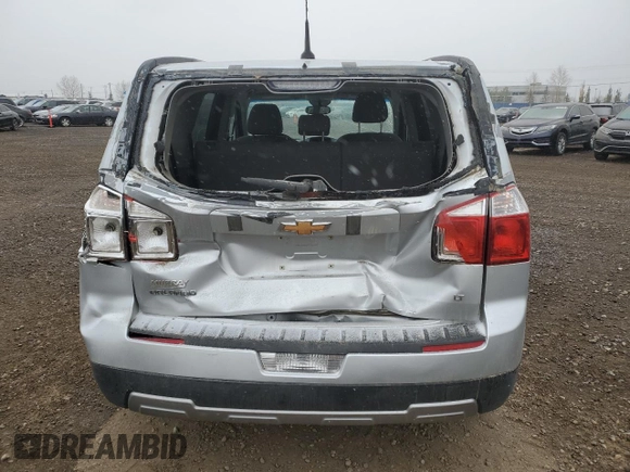 2012 Chevrolet Orlando 1LT z VIN KL77P2EM1CK550055, wystawiony jako Copart lot #77021754 z przebiegiem 127 987 mil mil oraz Szkoda całkowita • Salvage title. Historia ofert i sprzedaży dostępna na DreamBid. Obrazek 6.