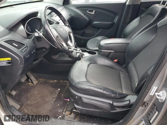 2010 Hyundai Tucson GLS with VIN KM8JU3AC2AU113747, listed as a Copart auction lot 48031375 with 220,982 mi miles and Salvage Title. Bid and sale history available at DreamBid. Image 7.
