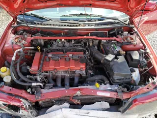 2002 Mazda Protege z VIN JM1BJ245821588413, wystawiony jako Copart lot #58692345 z przebiegiem 205 242 mil mil oraz Szkoda całkowita • Salvage title. Historia ofert i sprzedaży dostępna na DreamBid. Obrazek 11.