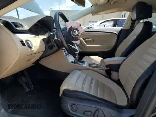2014 Volkswagen CC R-Line with VIN WVWBP7AN0EE524850, listed as a Copart auction lot 52026104 with 92,196 mi miles and Salvage Title. Bid and sale history available at carsss.com. Image 7.