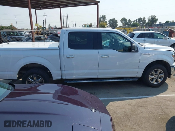 2019 Ford F-150 XL with VIN 1FTEW1C44KKC60773, listed as a IAAI auction lot 42706042 with 185,864 mi miles and . Bid and sale history available at DreamBid. Image 14.