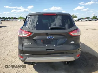 2015 Ford Escape SE with VIN 1FMCU9G91FUA11368, listed as a Copart auction lot 55069465 with 107,891 mi miles and Salvage Title. Bid and sale history available at DreamBid. Image 6.