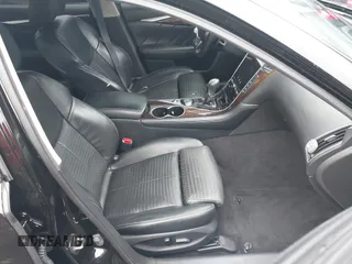 2015 Infiniti Q50 Premium with VIN JN1BV7AR1FM411864, listed as a IAAI auction lot 40800193 with 104,154 mi miles. Bid and sale history available at carsss.com. Image 5.