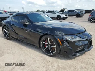 2021 Toyota GR Supra 3.0 with VIN WZ1DB0C00MW042681, listed as a Copart auction lot 59174324 with 7,718 mi miles and Salvage Title. Bid and sale history available at carsss.com. Image 4.