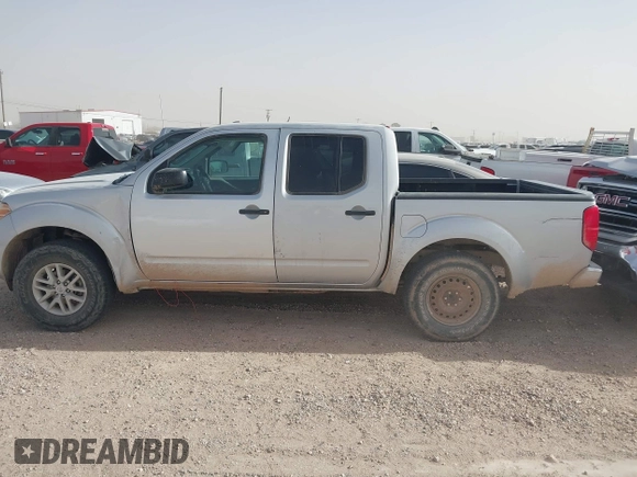 2014 Nissan Frontier SV with VIN 1N6AD0ER0EN759772, listed as a IAAI auction lot 41479252 with 153,630 mi miles and . Bid and sale history available at DreamBid. Image 14.