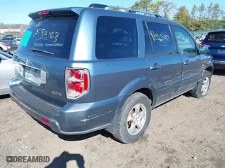 2006 Honda Pilot EX-L with VIN 5FNYF18536B017084, listed as a IAAI auction lot 41899517 with 999,999 mi miles. Bid and sale history available at carsss.com. Image 4.