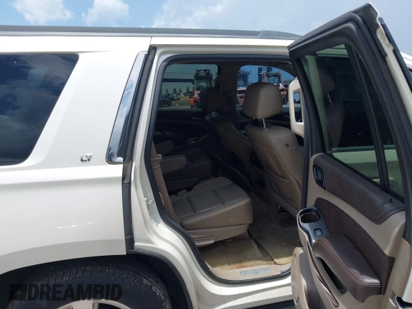 2015 Chevrolet Tahoe LT with VIN 1GNSCBKC0FR739951, listed as a IAAI auction lot 42332982 with 133,046 mi miles and . Bid and sale history available at DreamBid. Image 8.