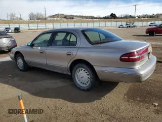 1995 Lincoln Continental with VIN 1LNLM97V4SY691749, listed as a Copart auction lot 41815915 with 69,582 mi miles and Salvage Title. Bid and sale history available at carsss.com. Image 2.