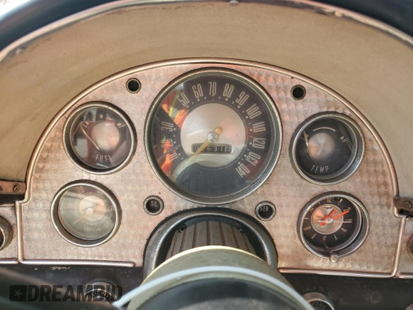 1957 Ford Thunderbird with VIN D7FH395675, listed as a Copart auction lot 77234434 with 15,312 mi miles and Salvage Title. Bid and sale history available at DreamBid. Image 9.