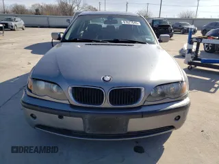 2005 BMW 3 Series 325i with VIN WBAET37405NJ86914, listed as a Copart auction lot 87677045 with 163,011 mi miles and Salvage Title. Bid and sale history available at carsss.com. Image 5.