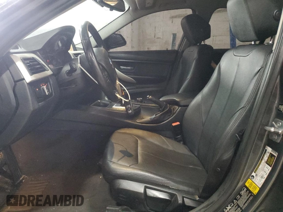 2015 BMW 3 Series 320i xDrive with VIN WBA3C3C52FK200479, listed as a Copart auction lot 52575125 with 153,930 mi miles and Salvage title. Bid and sale history available at DreamBid. Image 7.