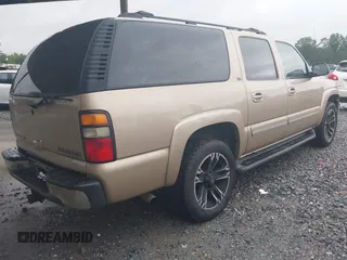 2005 Chevrolet Suburban LT z VIN 1GNFK16Z35J213484, wystawiony jako IAAI lot #42251630 z przebiegiem 384 604 mil mil oraz . Historia ofert i sprzedaży dostępna na DreamBid. Obrazek 4.