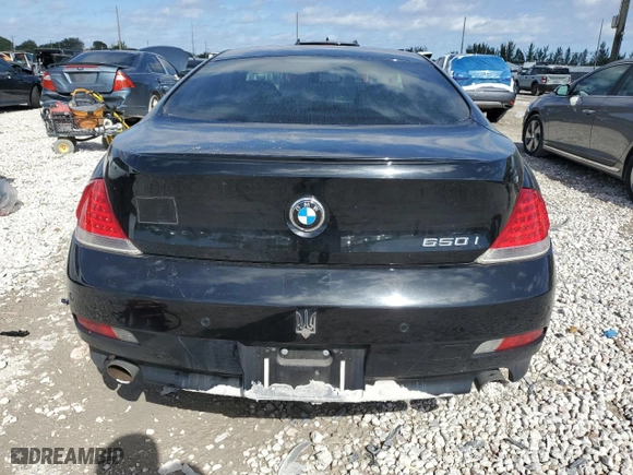 2007 BMW 6 Series 650i with VIN WBAEH13577CR52544, listed as a Copart auction lot 41953005 with 162,867 mi miles and Salvage Title. Bid and sale history available at carsss.com. Image 6.