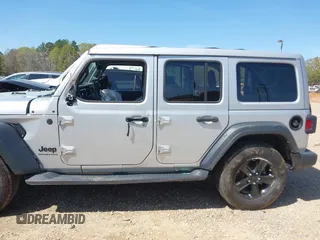 2023 Jeep Wrangler Sport z VIN 1C4HJXDG0PW582947, wystawiony jako IAAI lot #41932930 z przebiegiem 19 670 mil mil oraz . Historia ofert i sprzedaży dostępna na DreamBid. Obrazek 14.