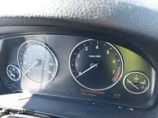 2014 BMW 5 Series 528i with VIN WBA5A5C58ED506079, listed as a IAAI auction lot 41236765 with 157,283 mi miles. Bid and sale history available at carsss.com. Image 7.