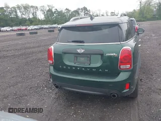 2019 MINI Countryman Cooper S z VIN WMZYT5C5XK3G94330, wystawiony jako IAAI lot #42310854 z przebiegiem 64 396 mil mil oraz . Historia ofert i sprzedaży dostępna na DreamBid. Obrazek 16.